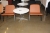 Around Fritz Hansen table, Ø 75 cm + 2 chairs, Storm from Hurup, dark nougat leather
