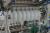 Papier / Folienschneider / Wrapper, aus dem Jahr 2012, bestående von div. Industriekomponenten, einschließlich 3 Stück. Elektromotoren von Siemens (unbekannt Kapazität) und Siemens-Sicherheitssystem und Simens Touch-Panel, Festo-Komponenten, einschließlic