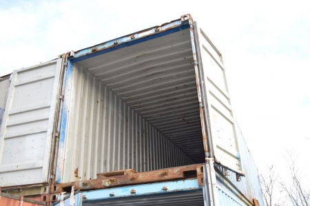 40 foot shipping container, steel, high keeper. Fine condition. Mounted on a second container