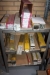 Rack with various welding electrodes + various welding electrodes on top shelve in (3) sections steel rack