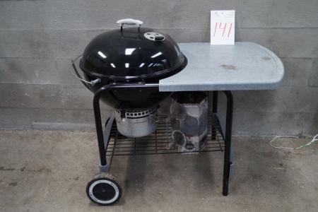 Weber charcoal grill with side table