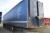 Renders 3-axle curtainsider trailer. Year: 02-09-2002. License number JN9766. Signed off. Brakes not tested