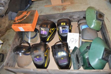Pallet with welding helmets and packing welding wire, 0.8 mm.