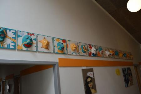 15 masks on the wall (to be dismantled by the customer)
