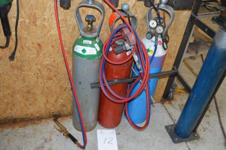 Oxygen and acetylene hoses and a burner as depicted