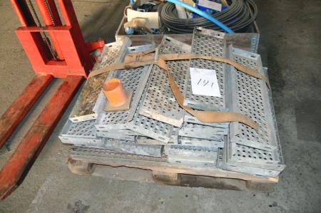 Pallet with parts for stairs, galvanized steps and landing grate
