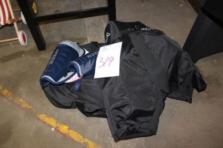 Bag with assorted ice hockey equipment