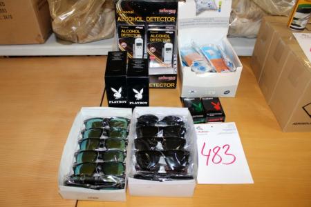 2 boxes of sunglasses + alcohol testers + Playboy condoms