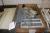 2 pallets with wire shelves + steel shelves + headboards etc.