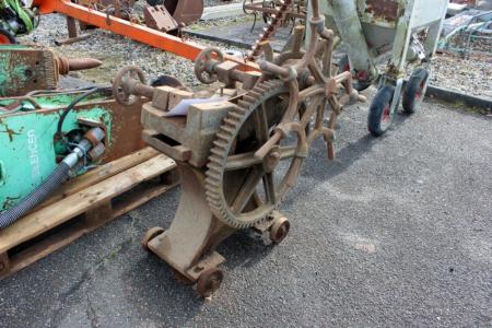 Antique ring roller for wagon wheels