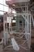 Manually elevating scaffolding on 3 rubber wheels, Layher