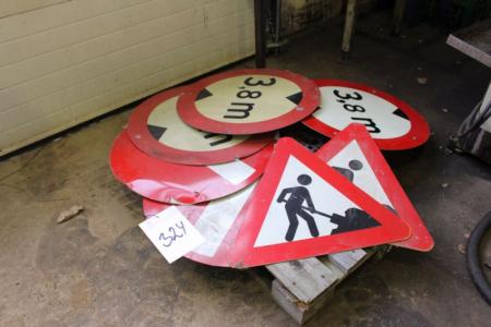 Pallet with various road signs