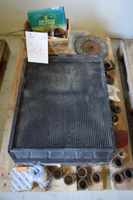 Various spare parts for tractor Ford 4000, radiator, clutch plate, filter M. M