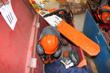 Wooden box with Stihl chainsaw + boots + cut trousers etc.