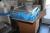 Hylder + væghængt bord i rustfri stå + rullebord med indhold