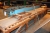 (2) roller conveyors + wood table