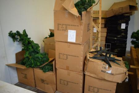 Various wreaths, artificial Christmas trees and Christmas tree stands