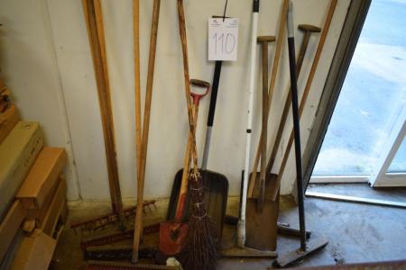 Various brushes and garden tools