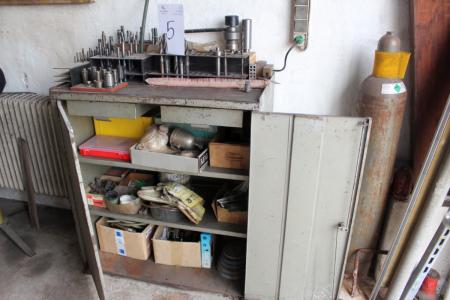 Steel cabinet containing various drills and slices etc.