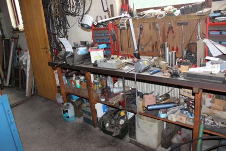 Workbench with vice containing various hand tools + consumables etc.