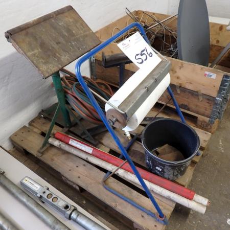 Pallet with paper stand, solder wire, oxygen / gas hose, ax heads, etc.