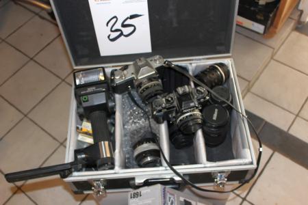 Box with Nikon Optical camera with many lenses and tripod + bag