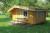 Log cabin with terrace. Equipped with kitchen with cabinets, bunk bed, sofa, dining table with 4 chairs. Dimensions: B: 4200 - D 3600 mm - H: 2000 (pages) by 50 cm overhang the sides. Height to tilt 2550 mm, 'Terrace: 1800 x 4200 mm overhang terrace 130 c