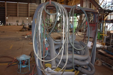 Cable bridge with 4 oxygen and acetylene outlets + compressed air distribution panel, 8 outlets + compressed air distribution panel + wire basket with exhaust cables + scrap iron on pallets + metal box + electrodes in boxes on the floor + bottle stand for