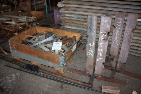 Scaffolding stands + scrap iron on pallet on the floor + various tube fittings on pallet + steel transport box