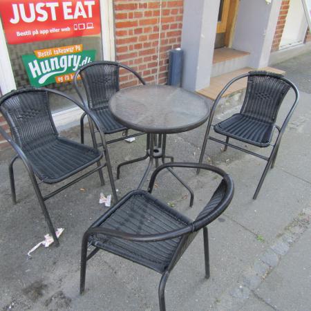 café table with four chairs outdoors + A-plate