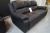 Leather sofa, black w. Built-stool