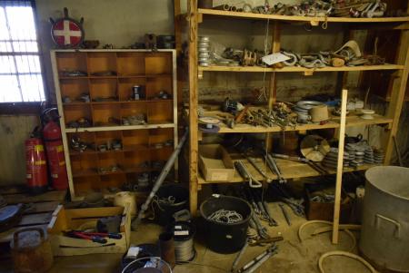 Bookcase with various wire, boat equipment etc.