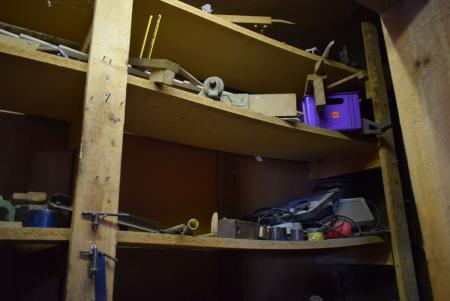 room with various power tools + 2 coffee mills
