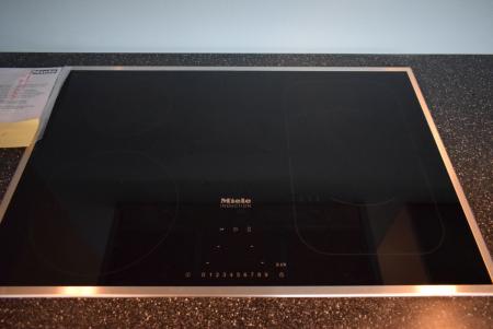 Miele Induction with 4 zones, model KM6347. B: 764xD504 mm. Illuminated Reg. Retail price 13295 kr. Cooktop is on the images mounted in environment1 and are sold separately and dismantled.