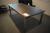 Mødebord 30mm sort linoleum på rustfri stålstel, oplyst specialfremstillet. Mål 210x105x77, oplyst nypris 18950 kr.