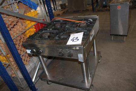 Gas stove with four burners on wheels D95 cm H 80 cm W 85 cm, not tested