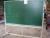 School board on tripod / wheel. Reversible - Chalkboard on both sides. Writing surface about 118 x 197 cm. A bad wheel