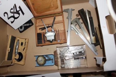 Box with various measuring tools