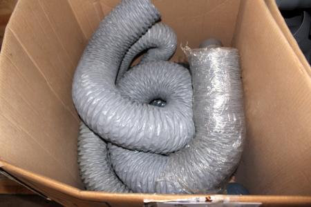 Box with suction hose
