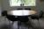 Oval table with 6 chairs with black fabric