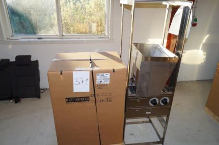 Coffee Machine mrk. Wittenborg ES-7100th Unused. NOTE Cup holder missing. Stainless steel rack included. NOTE: Base to the stand missing the bottom