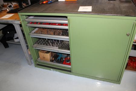 Steel cabinet with pull-out shelves with content