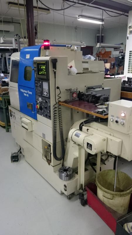 CNC-controlled turning machine, Nakamura Tome TMC 12 Fanuc control 21 T Year 1998-99 cutting time 6904 tim. Spindle Ø42 Subject grabbers and small item box Chip