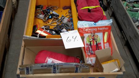 Pallet with lifejackets and various safety equipment.