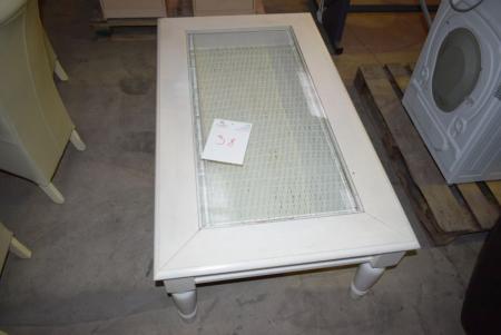 Off-white coffee table, wood with glass. L 140 B X 80 X H 52 cm. Stigmatize the table