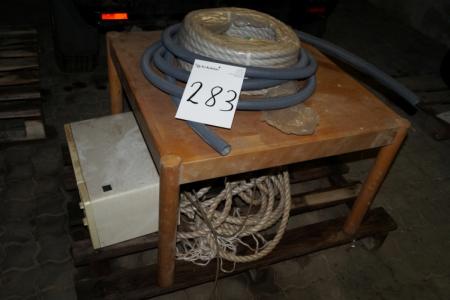 Pallet table, rope and microwave.