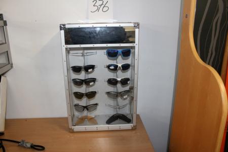 Glass cabinet with bicycle glasses