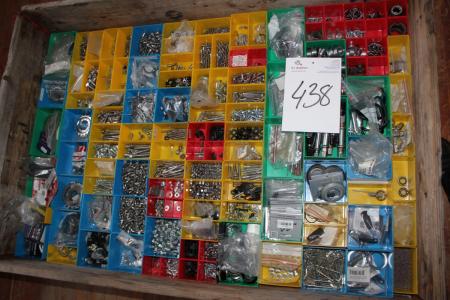 Pallet with various spare parts for bicycles. Bolts, nuts, bearings, gears, etc.