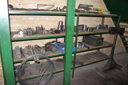 Steel Shelving containing various accessories for lathe