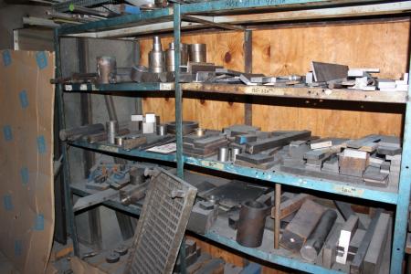 Steel shelving and table containing various iron